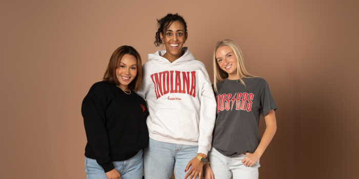 3 girls smiling in Indiana Hoosiers Merch