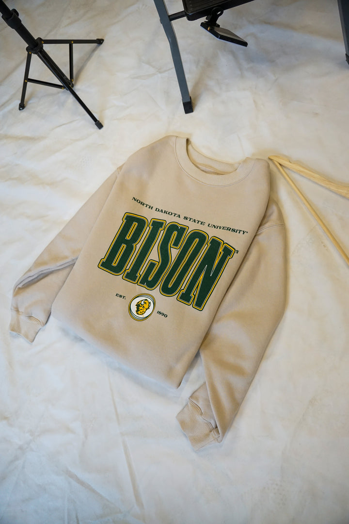 a flat lay image of a Bison crewneck on a white background