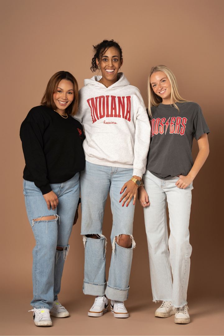 picture of three girls wearing Indiana University Hoosiers crew neck, hoodie, and t-shirt