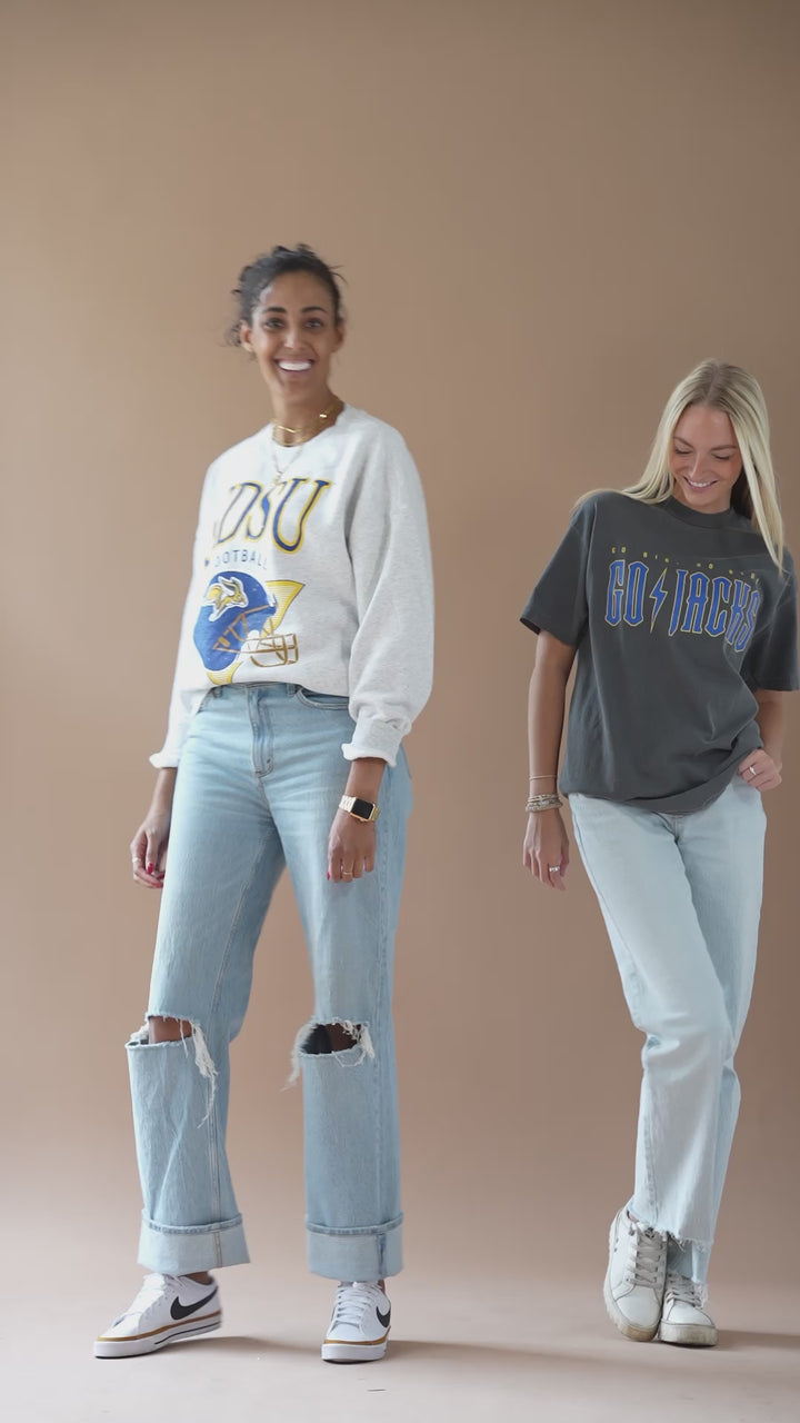 video of two girls dancing together while wearing two different SDSU jackrabbits styles