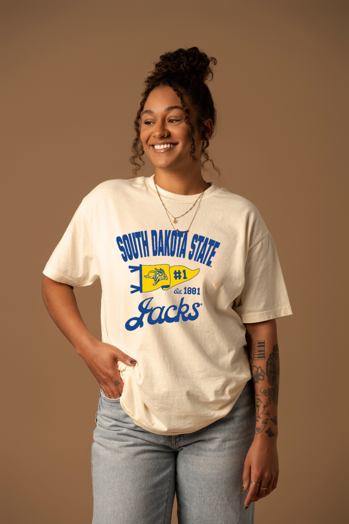 Woman wearing a cream South Dakota State Jacks t-shirt