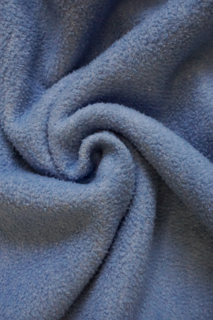 Close-up of blue fabric with a soft texture