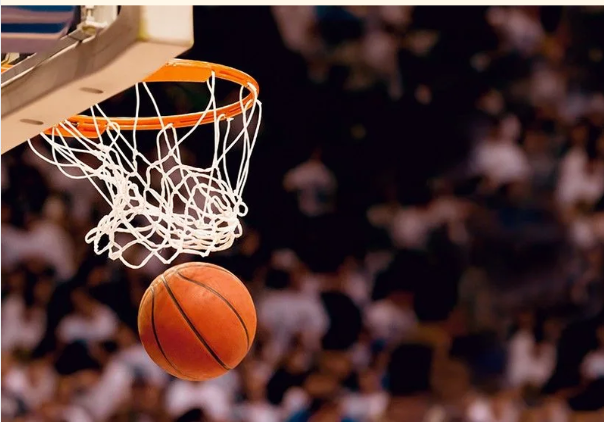 Image of a basketball going through a hoop