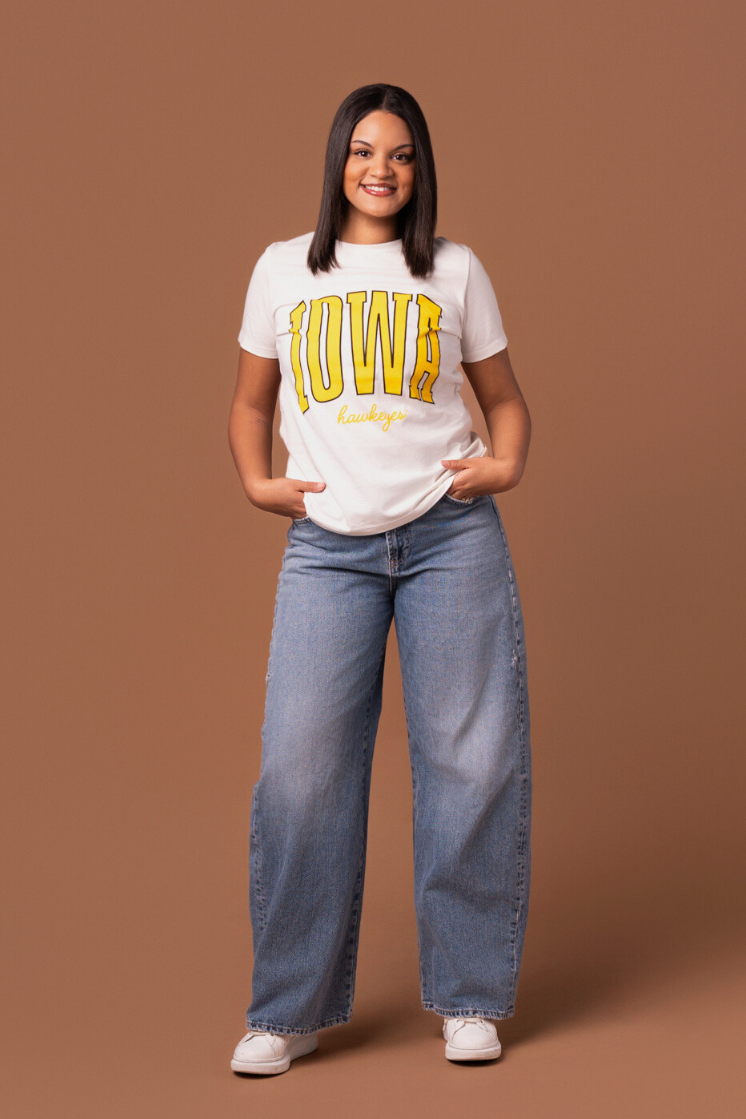 women wearing a white t-shirt with 'Iowa Hawkeyes' text in yellow
