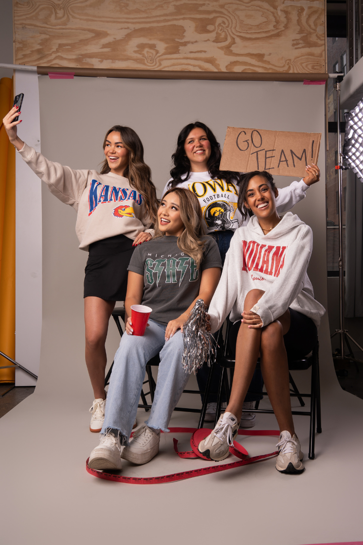 photo of four girl wearing Fan Girl's campus collection game day apparel