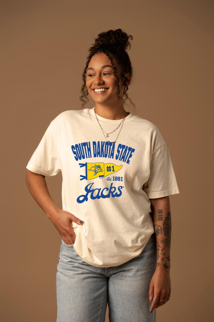 Woman wearing a cream South Dakota State Jacks t-shirt 
