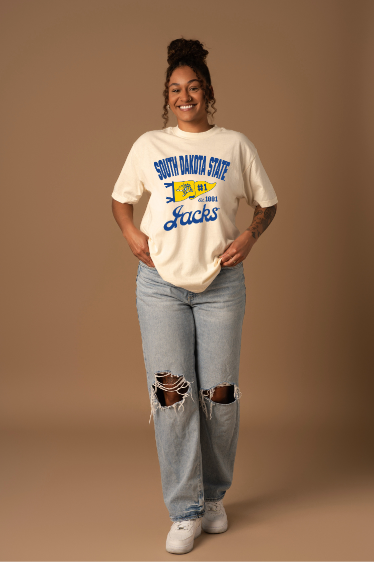 Woman wearing a cream South Dakota State Jacks t-shirt 