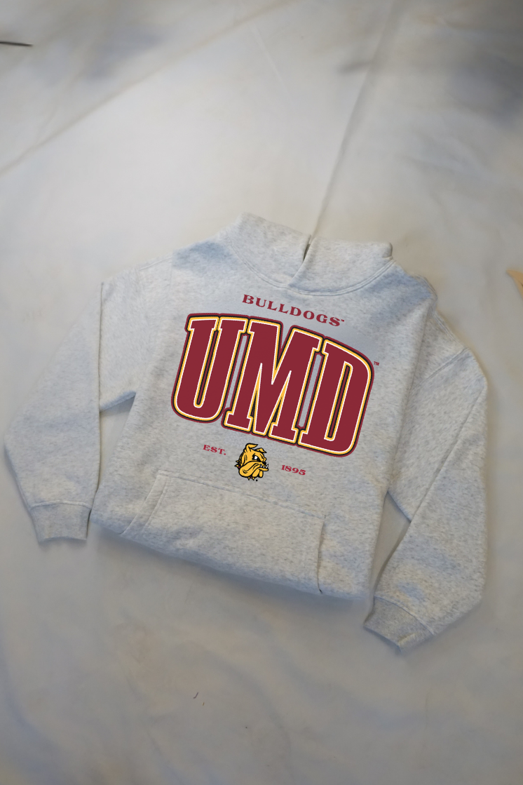 Gray sweatshirt with 'UMD' and 'Bulldogs' text on a light gray background