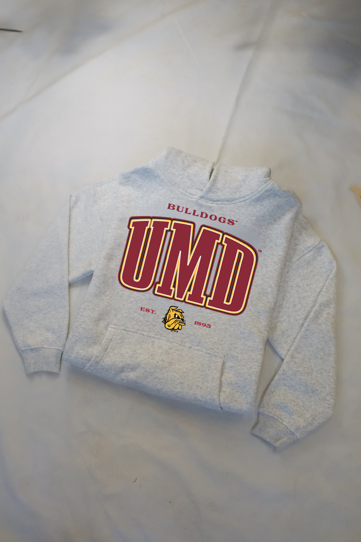 Gray sweatshirt with 'UMD' and 'Bulldogs' text on a light gray background