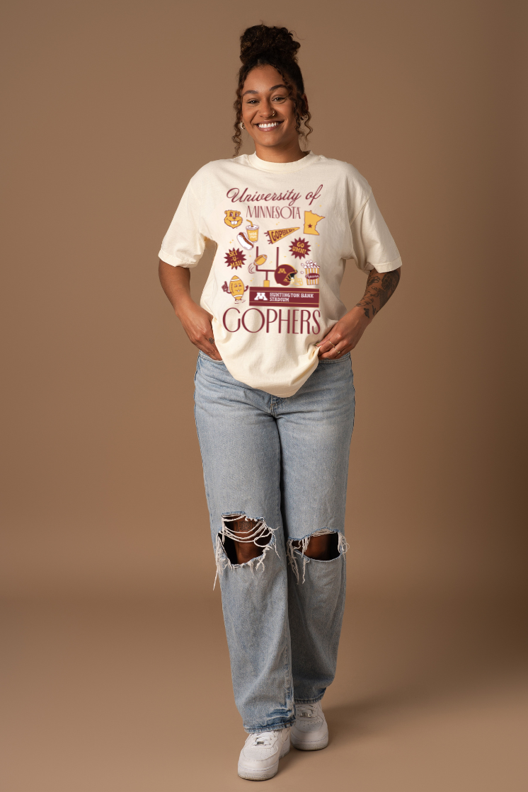 Woman wearing a 'University of Minnesota Gophers' t-shirt on a brown background